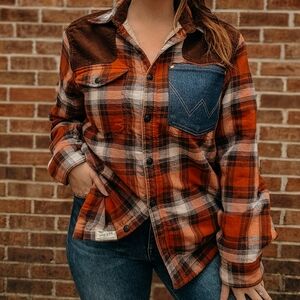 Sherpa lined flannel shacket with wrangler denim pocket